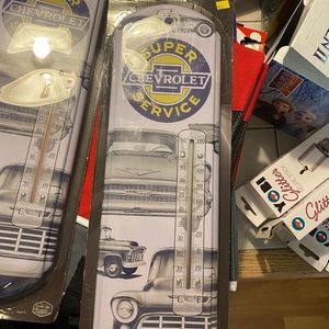 Chevy metal thermometer sign.